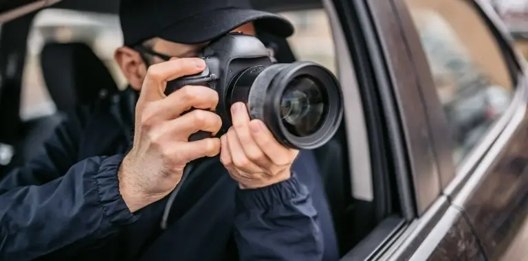 osoba z&nbsp;aparatem